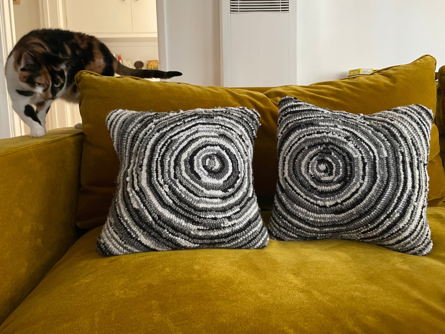 Loop pile spiral designs