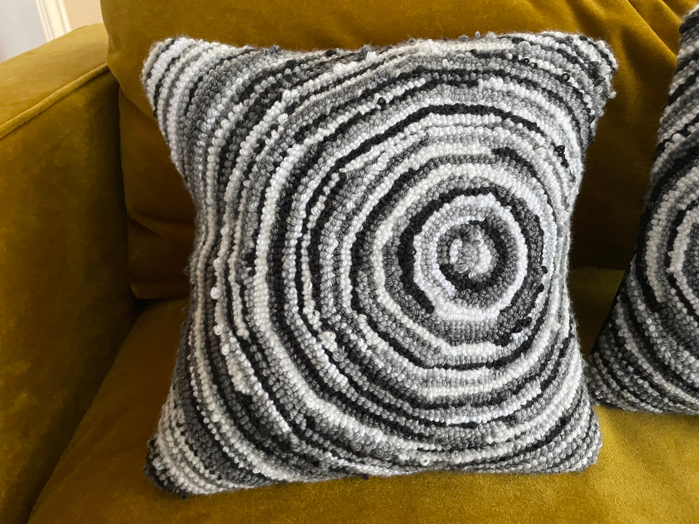 Loop pile tufted spiral pillows